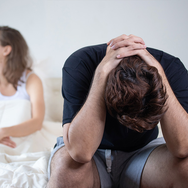 Couple in argument due to man’s erectile dysfunction.